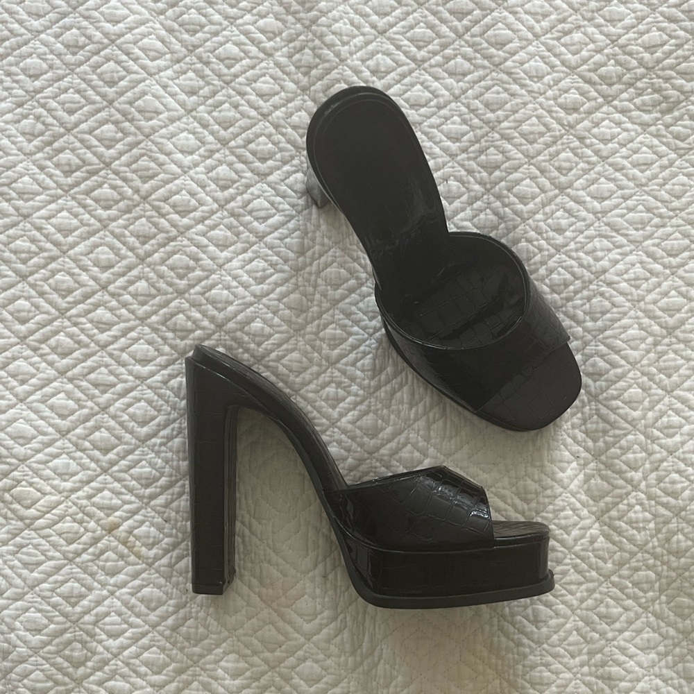 Never worn croc heels in a size eight